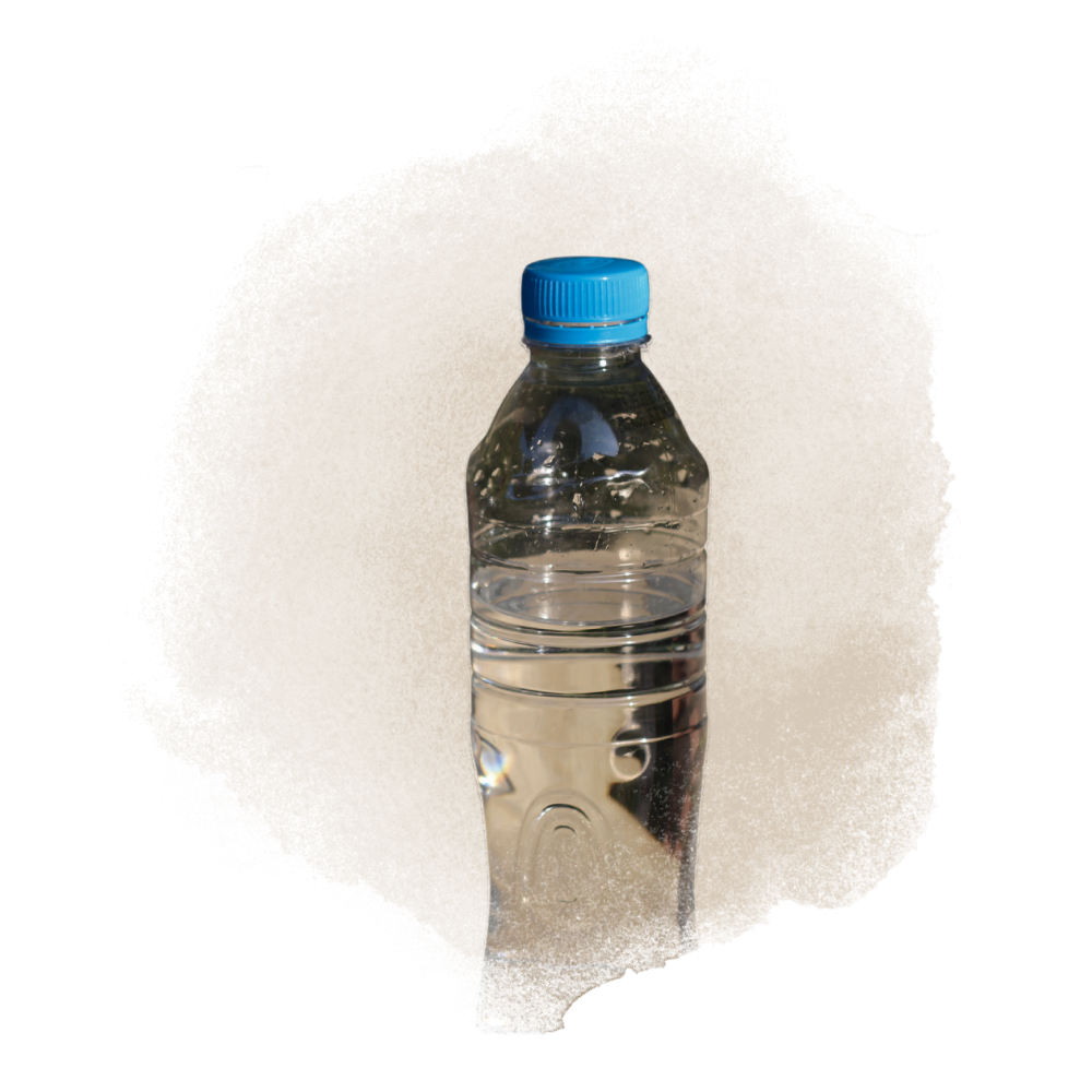 A photo of a hand holding some coffee beans