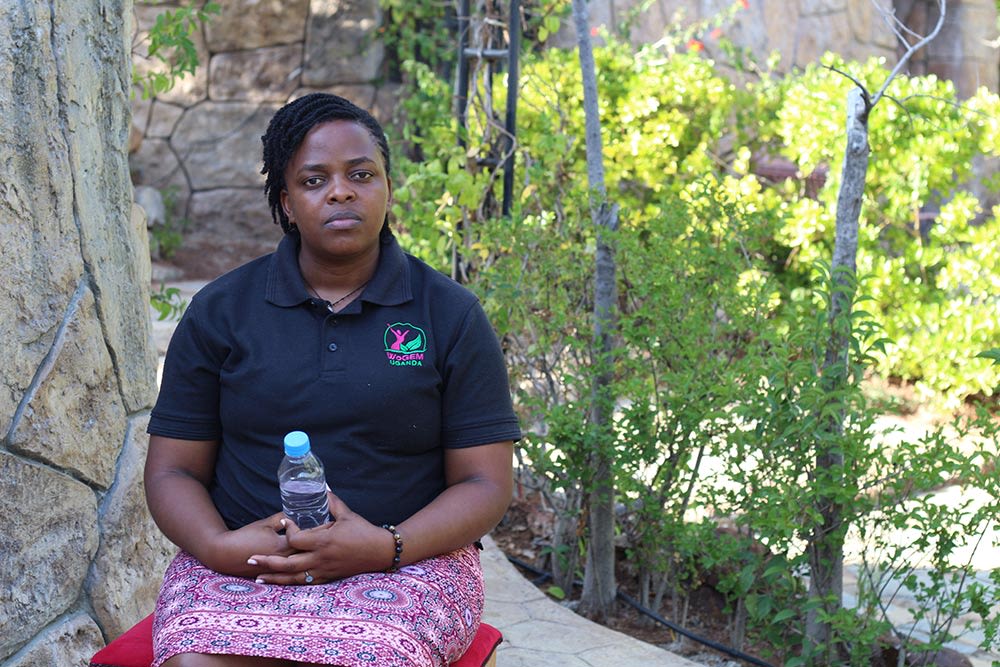 A photo of Ireen holding a plastic bottle